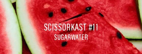 Scissorkast #11 Sugarwater Text Scissorkast #11 Sugarwater auf aufgeschnittener Wassermelone